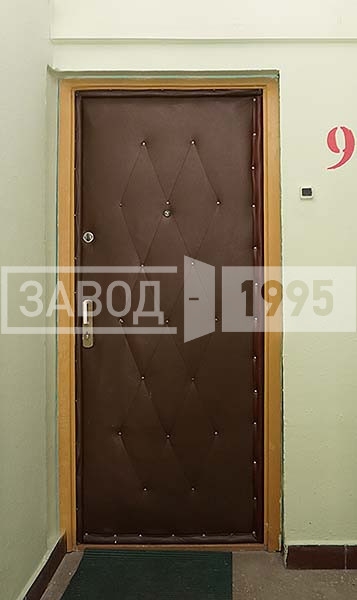 Монтаж входной двери в квартиру с отделкой винилискожей в Подольске